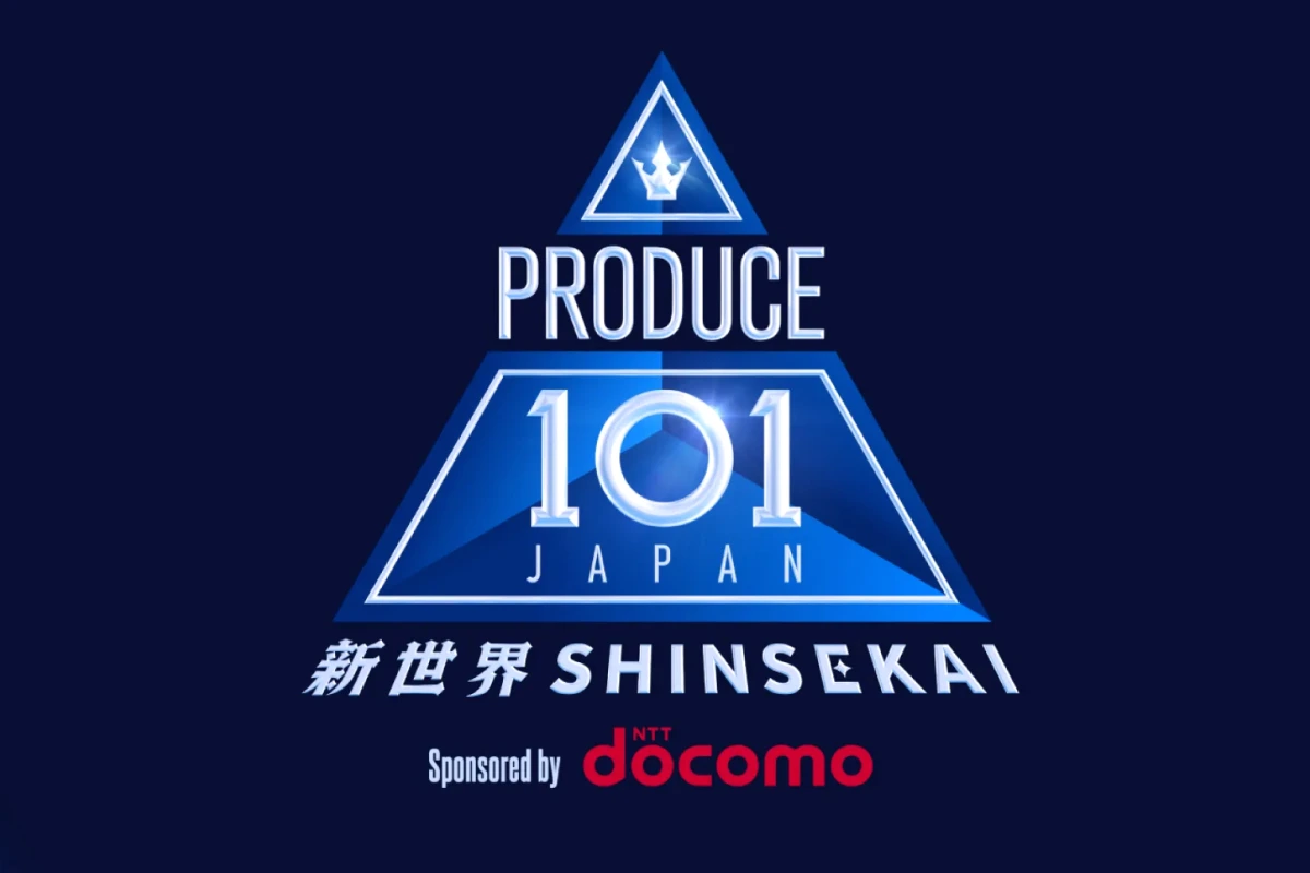 Candidats de Produce 101 Japan sur scène à Shinsekai, en larmes, sous les projecteurs avant la finale